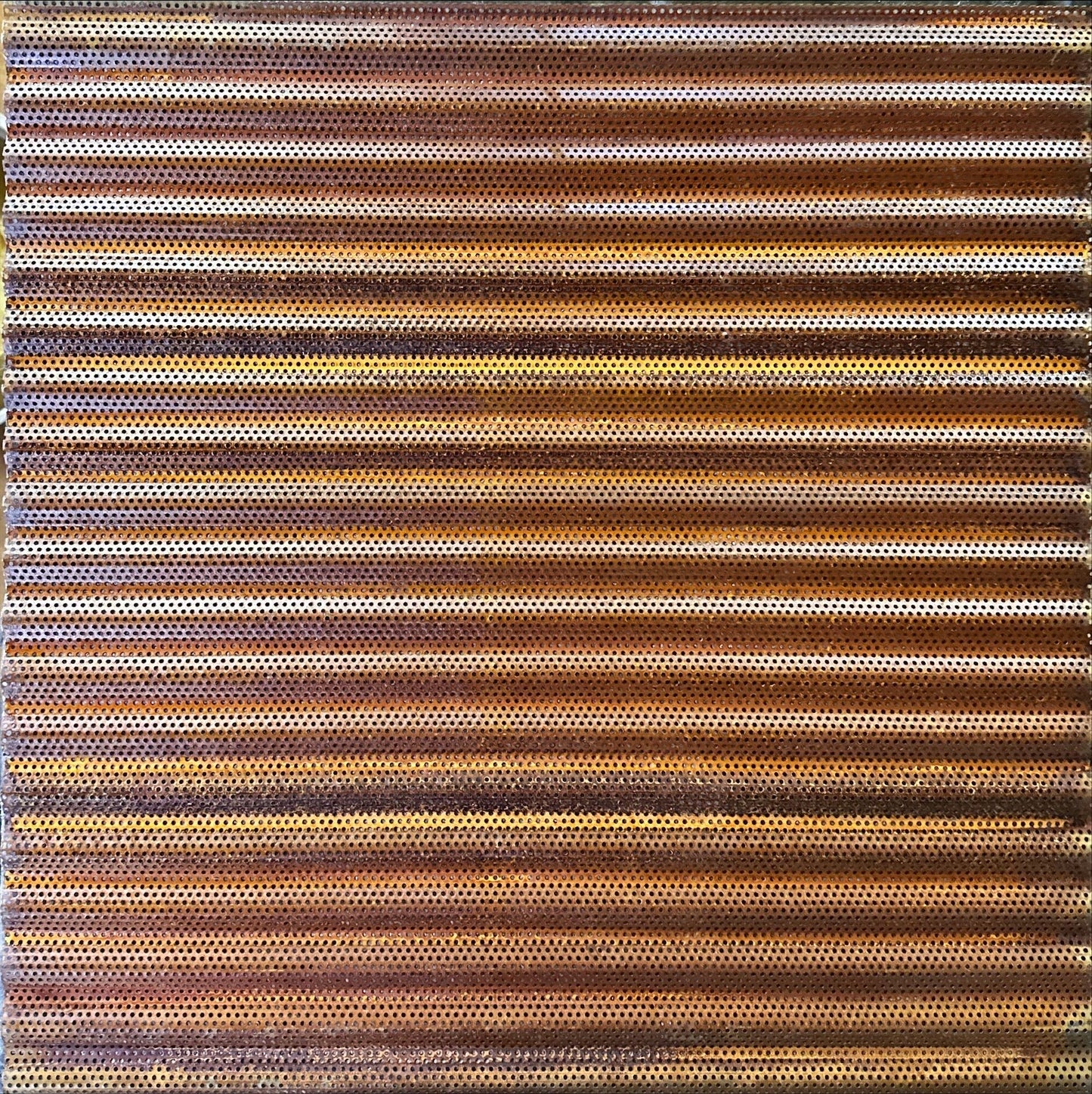 Rusted perforated metal acoustical ceiling tile