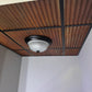 Custom cut corrugated metal ceiling tiles in commercial application