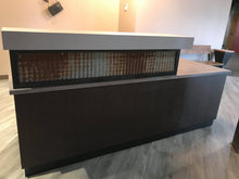 Custom cut reclaimed tin panel installation