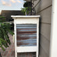 Custom corrugated metal panels installed on accent wall